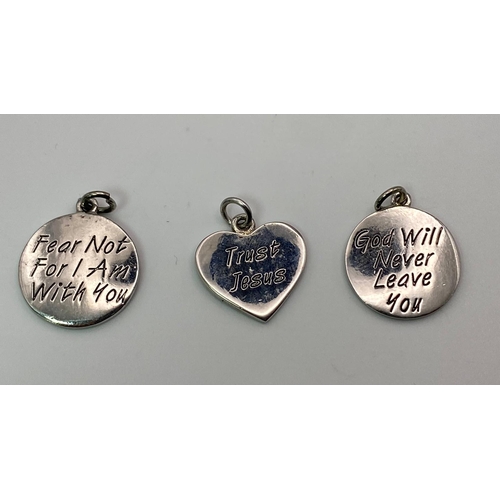 1154 - Three Sterling silver pendants with religious quotes. Wt 7.9g.