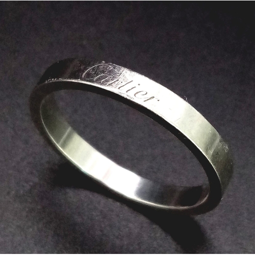 129 - A platinum CARTIER band ring, size: T, weight: 6g. 14255