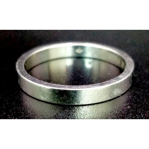 129 - A platinum CARTIER band ring, size: T, weight: 6g. 14255