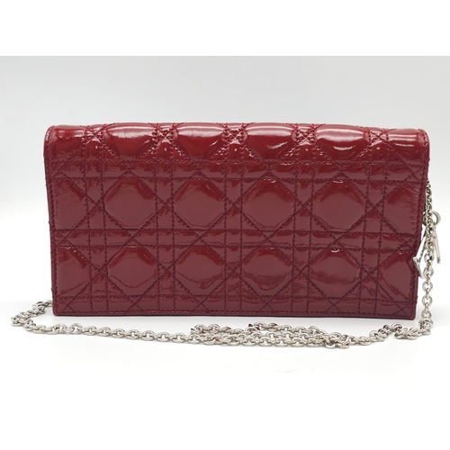 206 - A Christian Dior Red 'Lady Dior' Bag. Cannage quilted patent leather exterior. Magnetic closure, sil... 