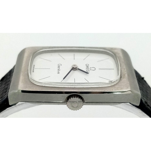 237 - A Classic Vintage Omega Geneve Quartz Watch. Black leather strap. Stainless steel rectangular case -... 