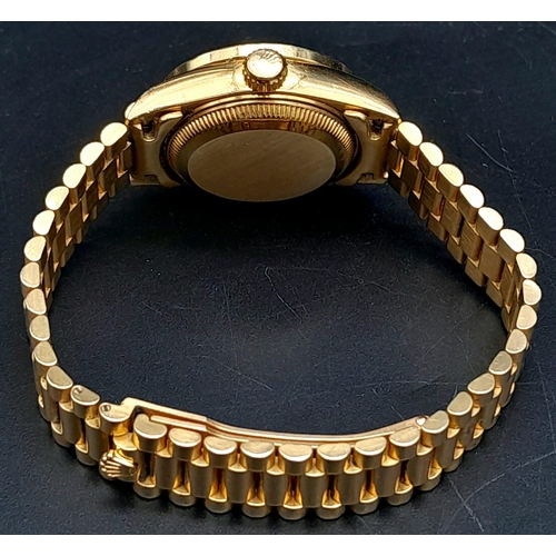 25 - An 18K Gold and Diamond Rolex Oyster Perpetual Datejust Ladies Watch. 18k gold bracelet and case - 2... 