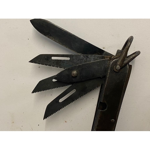 289 - A Rare British WW2 Special Operations Executive Escape and Evade Multi-Tool. Seven tools including b... 