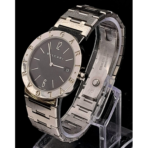 359 - A Bulgari BB33 Quartz Gents Watch. Stainless steel bracelet and case - 33mm. Black dial with date wi... 