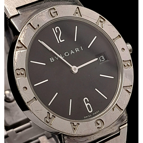 359 - A Bulgari BB33 Quartz Gents Watch. Stainless steel bracelet and case - 33mm. Black dial with date wi... 