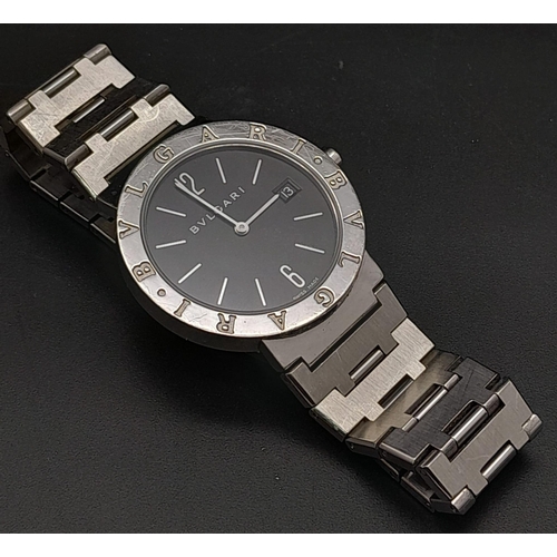 359 - A Bulgari BB33 Quartz Gents Watch. Stainless steel bracelet and case - 33mm. Black dial with date wi... 