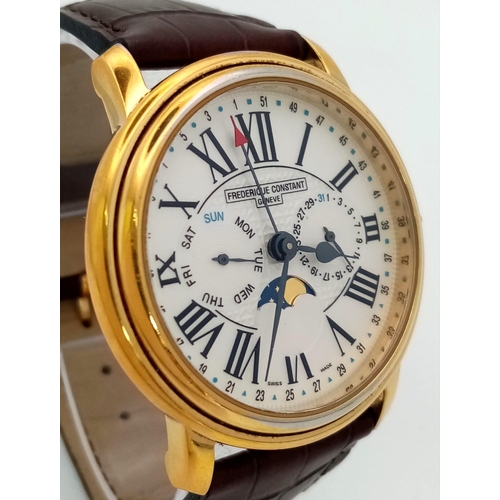 482 - A Frederique Constant Moonphase Quartz Gents Watch. Brown leather strap. Gold plated case - 40mm. Wh... 