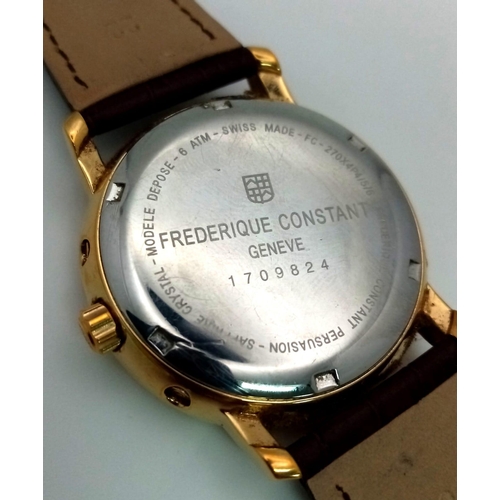 482 - A Frederique Constant Moonphase Quartz Gents Watch. Brown leather strap. Gold plated case - 40mm. Wh... 