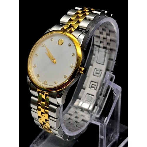 516 - A Movado Two Tone Quartz Ladies Watch. Two tone bracelet and case - 28mm. Mother of pearl dial. In w... 