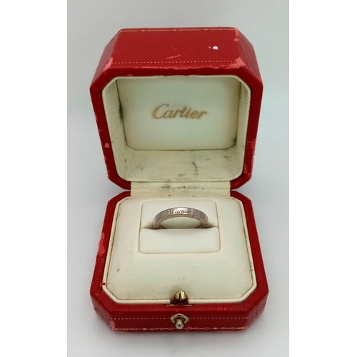 60 - A vintage, 19 K white gold CARTIER band ring, fully hallmarked, size: O, weight: 6.7 g, in its origi... 