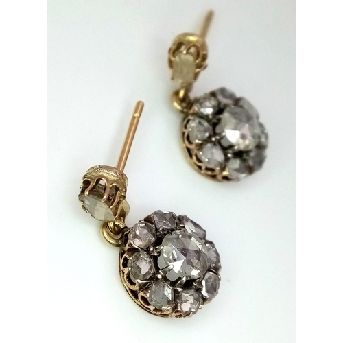 765 - A Pair of Antique (Possibly Georgian) 18K Yellow Gold and Diamond Earrings. Central round old cut di... 