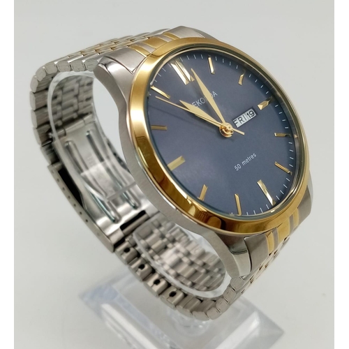 1076 - An Unworn Men’s Sekonda Bi-Metal Day/Date Watch in box with papers. 45mm including Crown. Full Worki... 