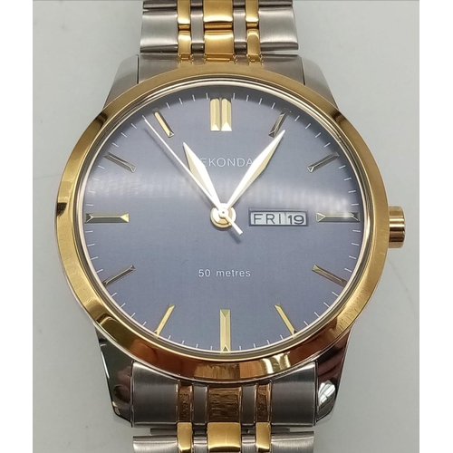 1076 - An Unworn Men’s Sekonda Bi-Metal Day/Date Watch in box with papers. 45mm including Crown. Full Worki... 