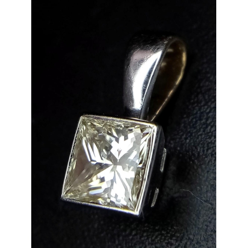 247 - A very elegant, white gold pendant with a princes cut diamond (0.55 carats). Weight: 0.75 g.14251