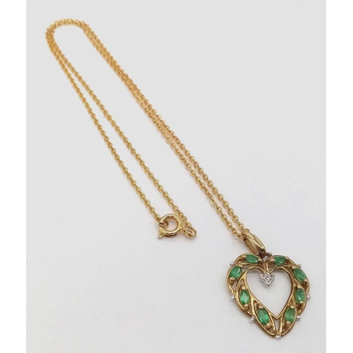 409 - A 9K Emerald and Diamond Heart-Shaped Pendant on a 9K Gold Necklace. 3cm and 40cm. 3.16g total weigh... 