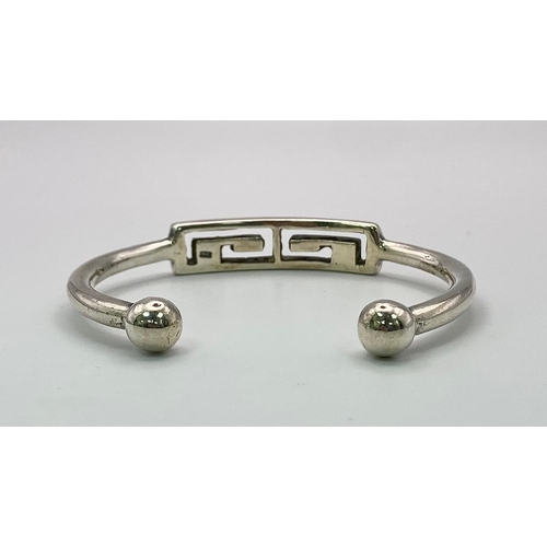 542 - A Vintage Heavy Greek Design Ball End Sterling Silver Bracelet. 6cm Inner Width, 29.14 Grams.