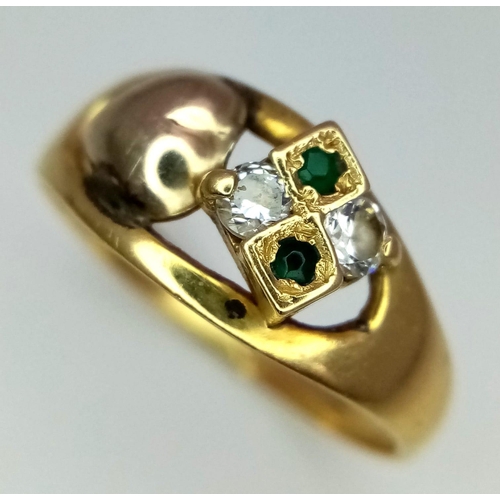 64 - An 18K Yellow Gold, Diamond and Emerald Ring. Four stone and heart decoration. Size N. 2.68g total w... 