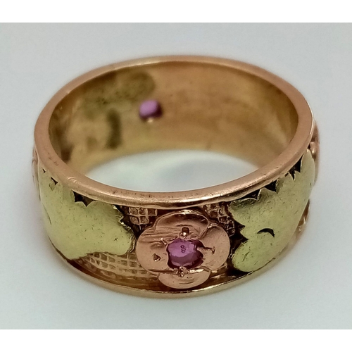 248 - A Vintage 14K Yellow and Rose Gold (tested) Ruby Ring. Four rubies reside in rose gold floral settin... 