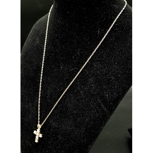 508 - A 9 Carat Gold Opal Set Cross Pendant Necklace 46cm Length. Cross Measures 2cm Length and is set wit... 