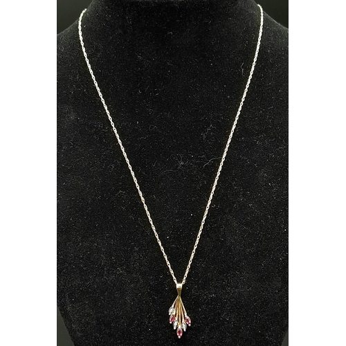 570 - A Fully Hallmarked 9 Carat Yellow Gold Diamond and Ruby Set Pendant Necklace 50cm Length chain. Pend... 