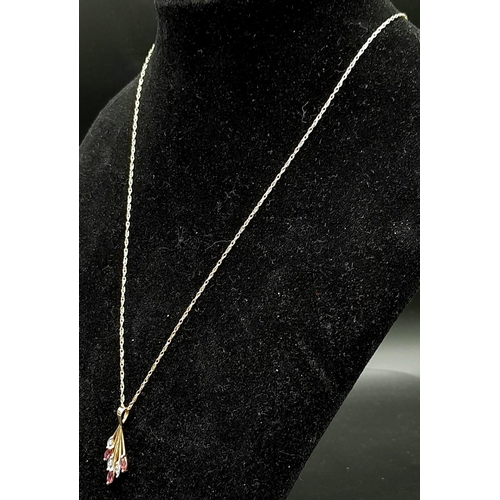 570 - A Fully Hallmarked 9 Carat Yellow Gold Diamond and Ruby Set Pendant Necklace 50cm Length chain. Pend... 