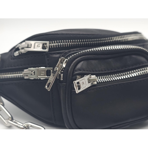 655 - A ALEXANDER WANG LEATHER BELT BAG. Six compartments with metal zips. Adjustable metal chains and lea... 