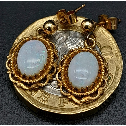 661 - Vintage or Antique 9 Carat Gold Opal Set Filigree Design Earrings 1.8cm Drop. 1.86 Grams Gross.