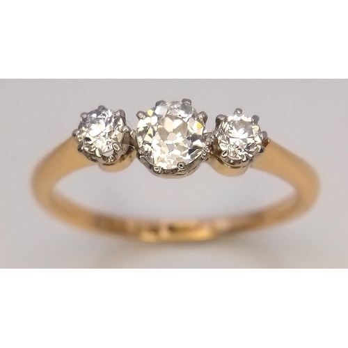 744 - A Vintage 18K Yellow Gold Diamond Ring. Three quality brilliant cut round diamonds. Size O. 2.3g tot... 