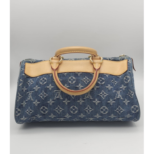 130 - 2005 Neo Speedy Louis Vuitton.
Indigo blue denim canvas/leather 2005 Neo Speedy bag from Louis Vuitt... 