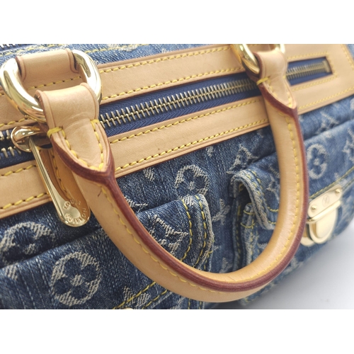 130 - 2005 Neo Speedy Louis Vuitton.
Indigo blue denim canvas/leather 2005 Neo Speedy bag from Louis Vuitt... 