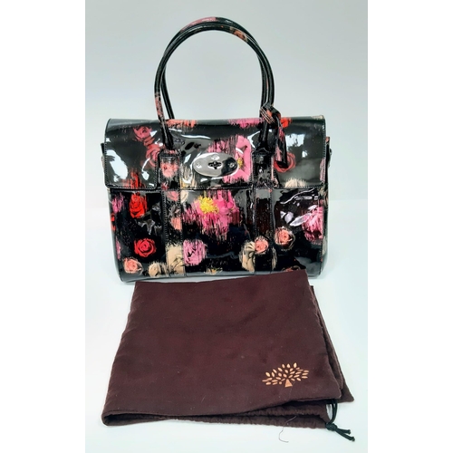 276 - Mulberry Classic Bayswater Handbag in Scribbly Floral Patent Leather.
Authentic Mulberry Handbag wit... 