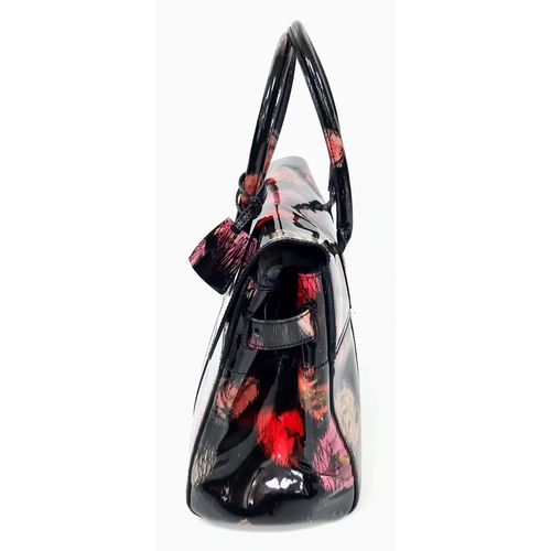 276 - Mulberry Classic Bayswater Handbag in Scribbly Floral Patent Leather.
Authentic Mulberry Handbag wit... 