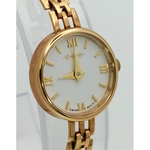 812 - A W.H.WILMOTT OF BIRMINGHAM LADIES 9K GOLD WATCH WITH SOLID GOLD STRAP , WHITE DIAL AND SWISS MOVEME... 