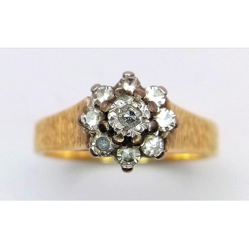 1103 - A VINTAGE 18K GOLD DIAMOND CLUSTER RING .   3.9gms   size L