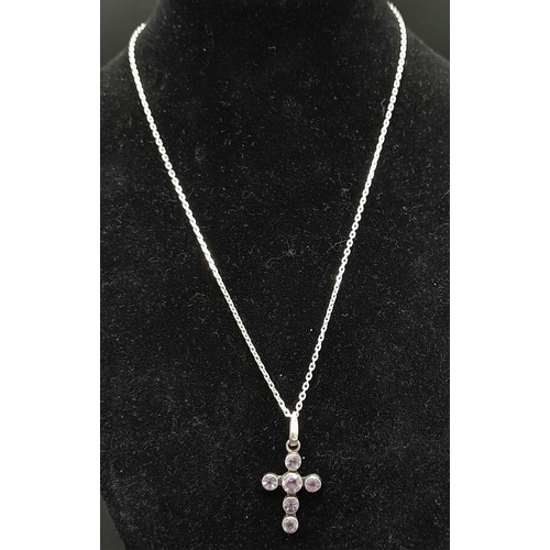 1158 - A Six Stone Amethyst Cross Pendant with a 20cm Necklace, Both Hallmarked for 925 Silver. Pendant len... 