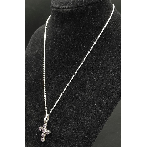 1158 - A Six Stone Amethyst Cross Pendant with a 20cm Necklace, Both Hallmarked for 925 Silver. Pendant len... 