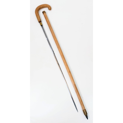 267 - A Vintage or Antique Rare Cane Sword Stick with Brass End Heavy Metal Bezel. 90cm Length. This Sword... 