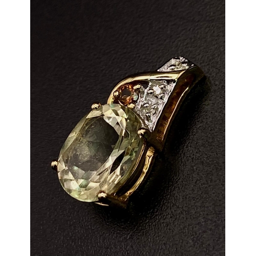 800 - A 10 Carat Yellow Gold Citrine, Green Garnet and Clear Stone (Most likely Diamond) Set Pendant. 1.8 ... 