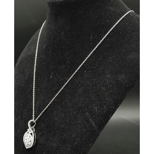 974 - An Exquisite New Clear Stone Set Pendant Necklace 52cm Length. Pendant measures 2.8cm Length. In Pre... 