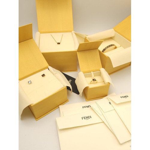 548 - A Designer Fendi Accessory Set. Includes: Bangle, necklace, ring and earring set. All are gold plate... 