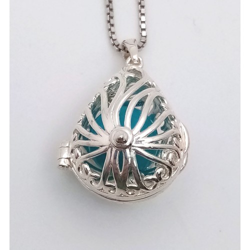 968 - A New Sterling Silver and Turquoise Filigree Cage Pendant Necklace. 84cm Sterling Silver Box Chain, ... 