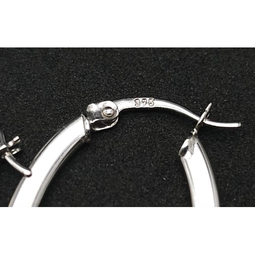 991 - 9kt White Gold Hoop Earrings.
New and Unworn.
W: 1.3g