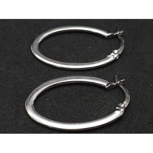 991 - 9kt White Gold Hoop Earrings.
New and Unworn.
W: 1.3g