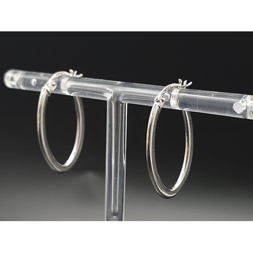 991 - 9kt White Gold Hoop Earrings.
New and Unworn.
W: 1.3g