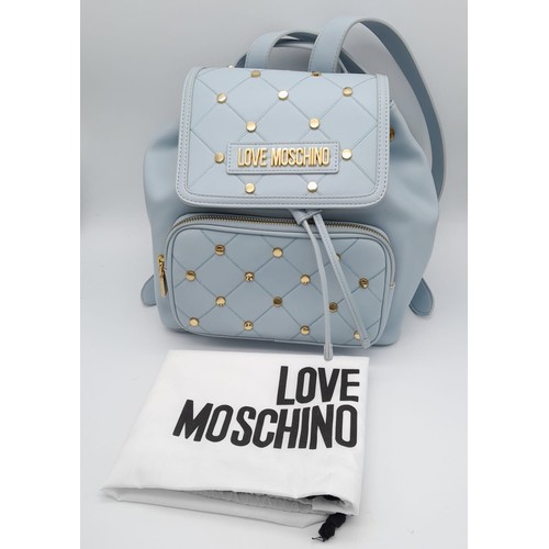 850 - Love Moschino Stud Backpack in Blue.
Great quality bag with loads of personality. Comes with Dust Co... 