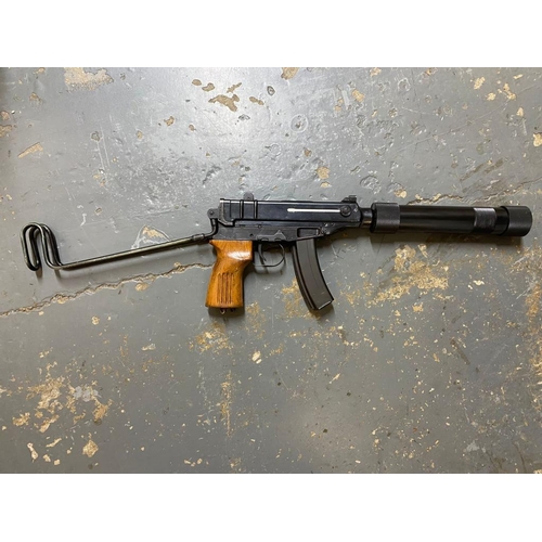 227 - A Deactivated Skorpion Sub Machine Gun with Suppressor. 
Moving dummy bolt. Removable silencer/suppr... 