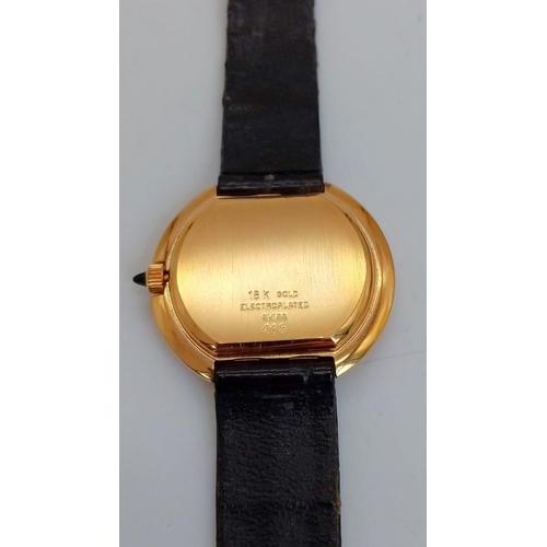 668 - A Ladies Vintage Swiss Made Jewel Face Set 18 Carat Gold Plated Mechanical Wind Watch. 35mm Includin... 