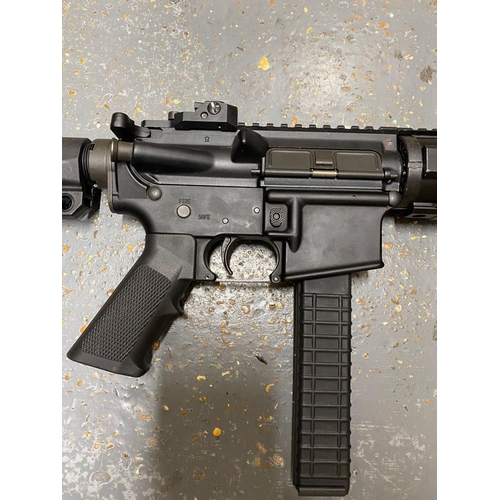 683 - An Deactivated (old spec) Supressed M4 9MM Assault Rifle. 
Comes with a detachable steel silencer/su... 