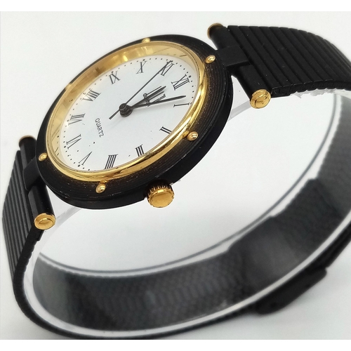 361 - A Dunhill Quartz Mid-Size Watch. Black metal strap and case - 32mm. White dial with roman numerals. ... 