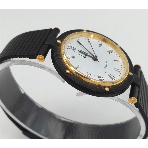 361 - A Dunhill Quartz Mid-Size Watch. Black metal strap and case - 32mm. White dial with roman numerals. ... 